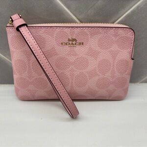 Like New Coach Powder Pink Corner Zip Wristlet